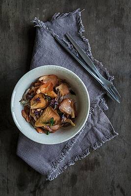 Fried Ppink Oyster Mushrooms With Herbs And Flowers In A Light Ceramic Bowl Print