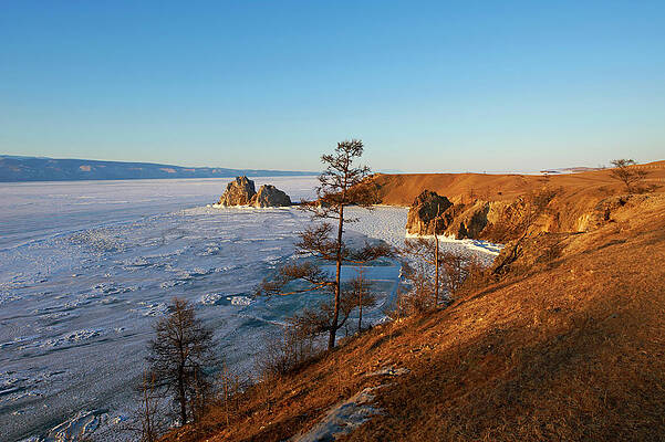 Freeze Wall Art featuring the digital art Frozen Lake & Shaman Rock, Russia by Bruno Morandi