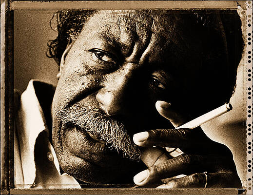 Contemplative Man Holding Cigarette Wall Art