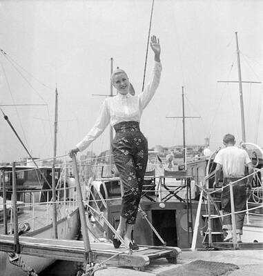 Woman Waving on a Docked Yacht Wall Art