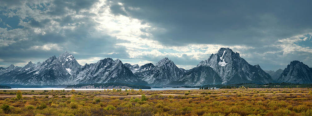 Majestic Mountain Range Under Cloudy Sky Wall Art