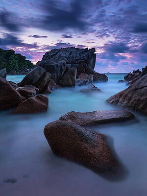 Atmospheric Wall Art featuring the digital art Granite Rocks On Anse Patates Beach In by Michael Breitung