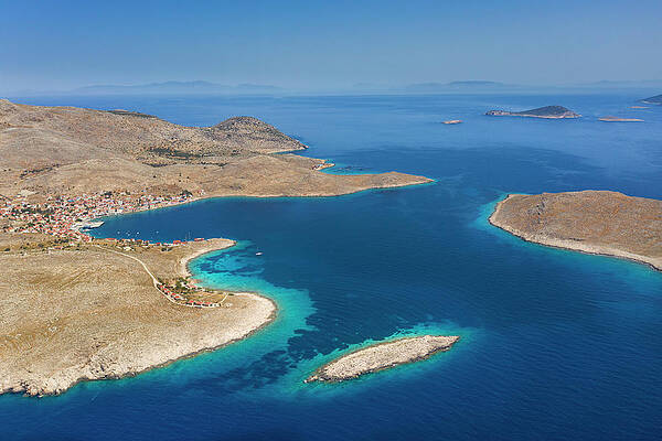 Small Digital Art - Greece, Aegean Islands, Mediterranean Sea, Aegean Sea, Greek Islands, Aegean, Dodecanese, Chalki Island, Bay Of Emborio With Island Of Nisaki On Right & Very Small Krevati In Lower Center by Massimo Ripani