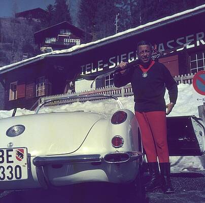 Man with Vintage Car and Skis Wall Art