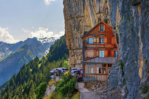 Summer Wall Art featuring the photograph Guest House Aescher-Wildkirchli Under A Cliff On Mountain Ebenalp In Switzerland by Miroslav Liska