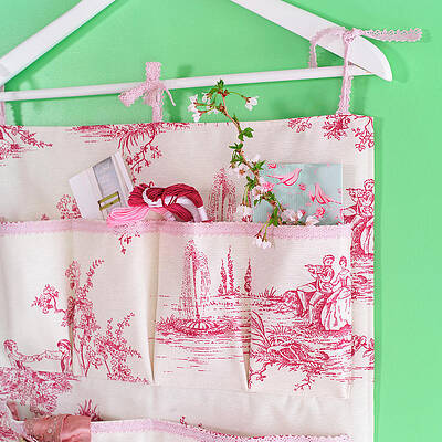 Hand-sewn Organiser Made From Toile-de-jouy Fabric Hanging From Clothes Hanger Print