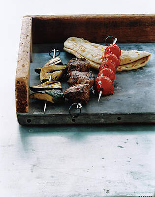 Sea Life Wall Art featuring the photograph Herbed Lamb Kebabs by Romulo Yanes