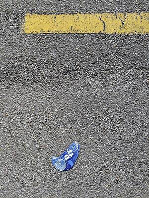 Wall Art featuring the photograph Hey, #BudLitter, Can You Point Me To A Yellow Line? by Jeremy Butler