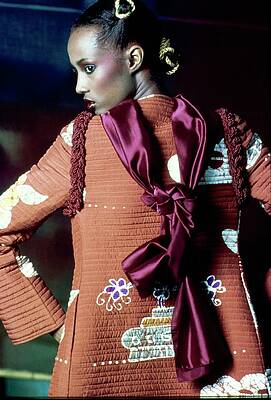 Wall Art featuring the photograph Iman In A Quilted Red Jacket by Ishimuro