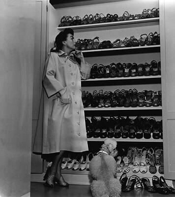 Woman Admiring Shoe Collection Wall Art