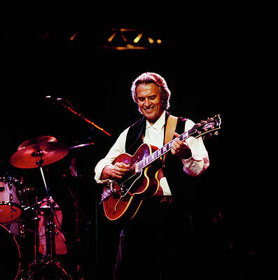 Guitarist Performing on Stage Photograph
