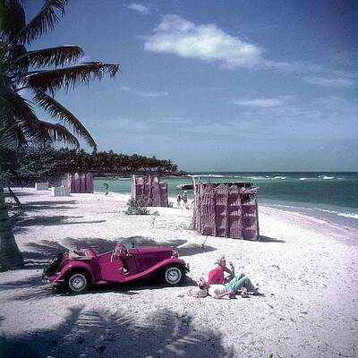 Vintage Beach Scene with Red Car Wall Art