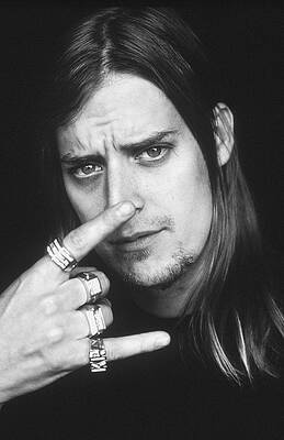 Man with Rings and Long Hair Wall Art