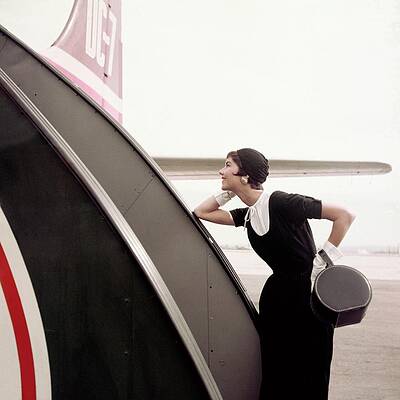 Wall Art featuring the photograph Leaning On An Airstair by Christa