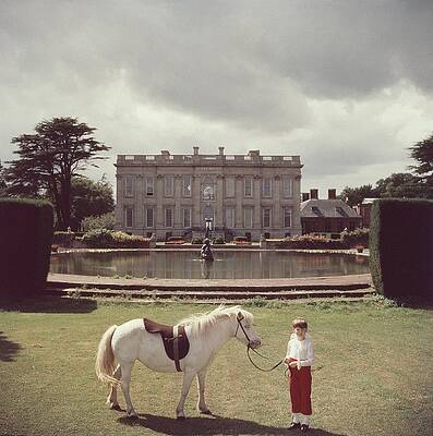 Child with Pony in Front of Mansion Wall Art