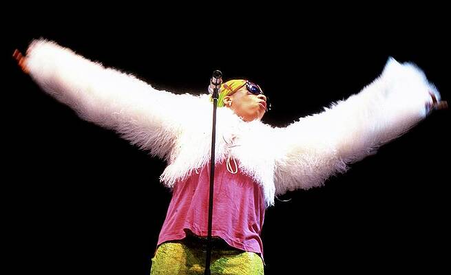 Performer in Fluffy White Outfit Wall Art