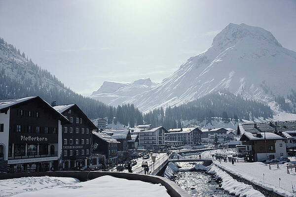 Snowy Village at Mountain's Base Wall Art