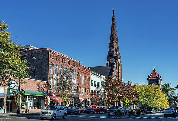 North America Wall Art featuring the digital art Main Street With Church by John Greim