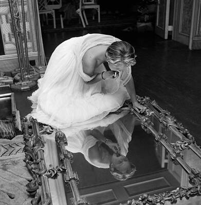 Woman Holding Camera Above Mirror Wall Art