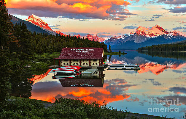 Wall Art featuring the photograph Maligne Lake Boathouse Fiery Summer Sunset by Adam Jewell
