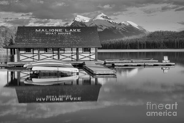 Wall Art featuring the photograph Maligne Lake Boathouse Summer Refelctions Black And White by Adam Jewell