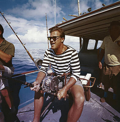 Man Fishing on a Boat Wall Art