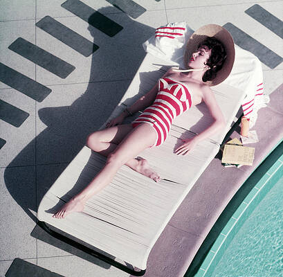 Woman Relaxing by the Poolside Wall Art