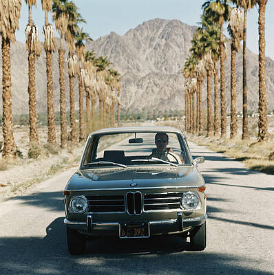 Wall Art featuring the photograph Mid Adult Man Driving Car Through by Tom Kelley Archive