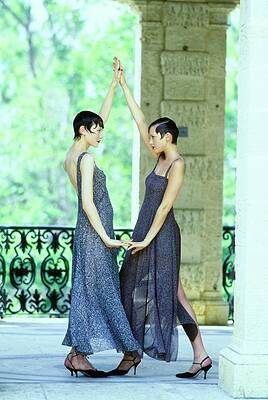 Wall Art featuring the photograph Models Dancing In Chiffon Dresses by Arthur Elgort