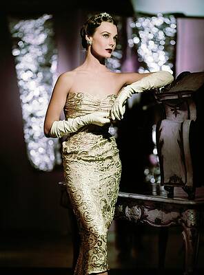 Wall Art featuring the photograph Model In Gold With Tiara by John Rawlings