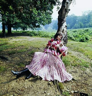 Wall Art featuring the photograph Model In Pink Zandra Rhodes Outfit Leaning by Patrick Lichfield
