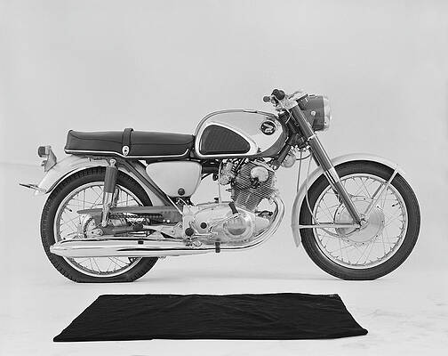 Wall Art featuring the photograph Motorbike Against White Background by Tom Kelley Archive