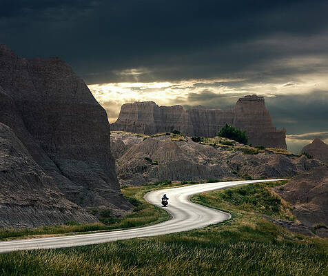 Wall Art featuring the photograph Motorcyclist In Badlands National Park by Ed Freeman