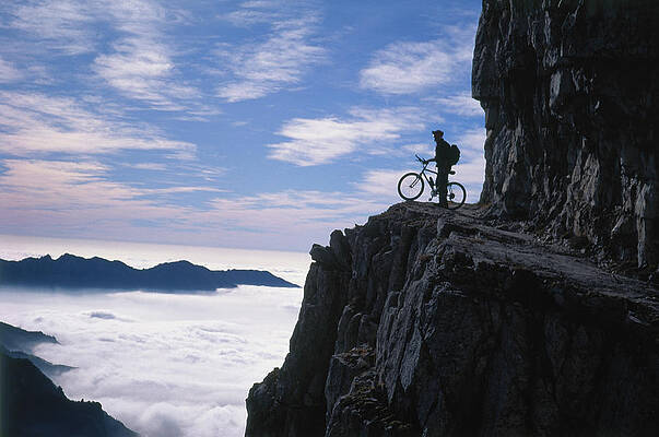 Atmospheric Wall Art featuring the digital art Mountain Biker, Lake Garda, Italy by Udo Bernhart