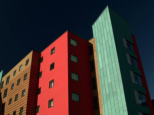 Modern Colorful Buildings Under Dark Sky Wall Art