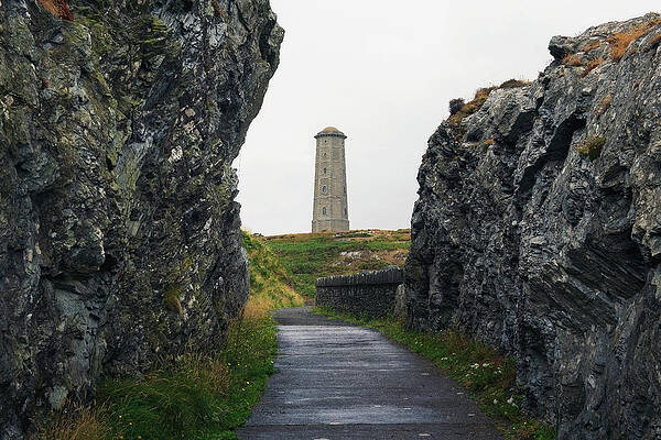 Tourism Wall Art featuring the photograph Pathway Leading Towards Wicklow Head Lighthouse In Ireland by Miroslav Liska