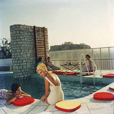 Women Relaxing by Pool with View Wall Art