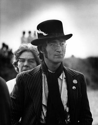 Man Wearing a Top Hat and Pinstripes Photograph