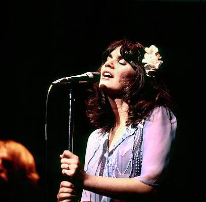 Singer Performing on Stage Photograph