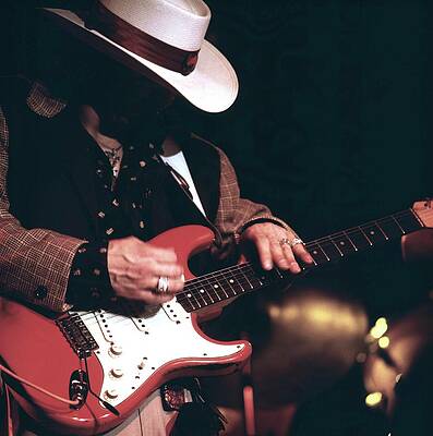 Musician with Red Electric Guitar Photograph