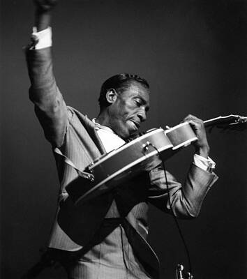 Dynamic Guitar Performance Photograph