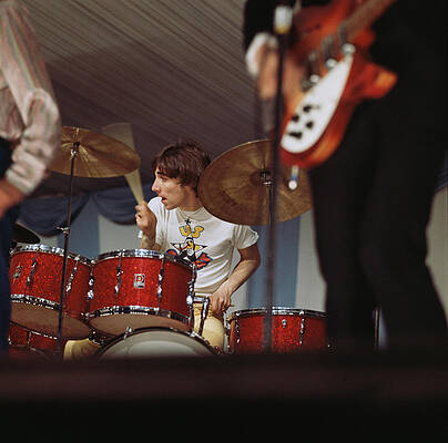 Energetic Drummer at Live Performance Photograph