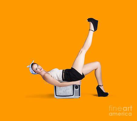 Wall Art featuring the photograph Pinup Girl Balancing On Television Set by Jorgo Photography