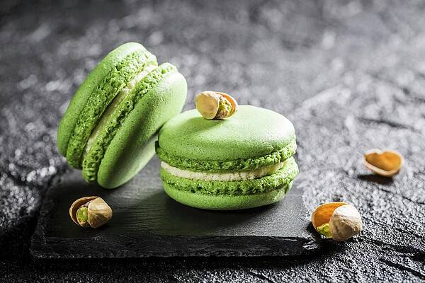 Pistachio Macaroons On A Black Stone Print