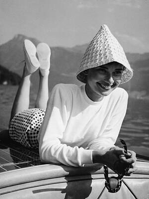 Smiling Woman Relaxing on a Boat Wall Art