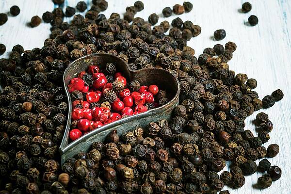 Red And Black Peppercorns With A Cutter Print