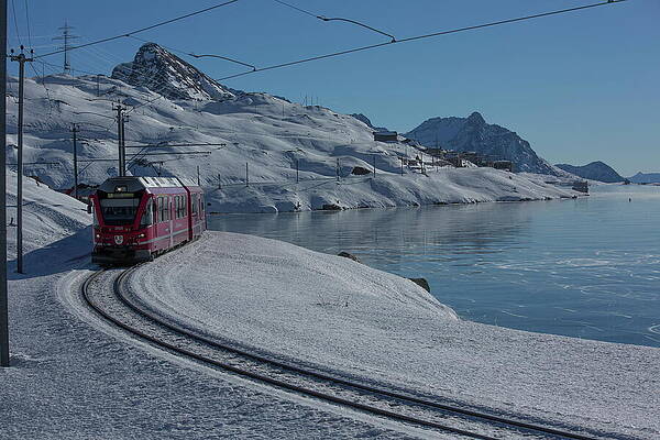 Freeze Wall Art featuring the digital art Rhaetian Railway At The Frozen Lago by Christof Sonderegger