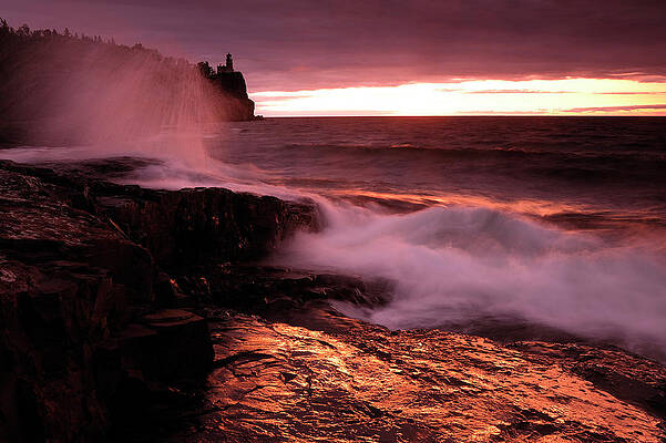 Lighthouse Wall Art featuring the digital art Rocky Beach With Waves by Heeb Photos