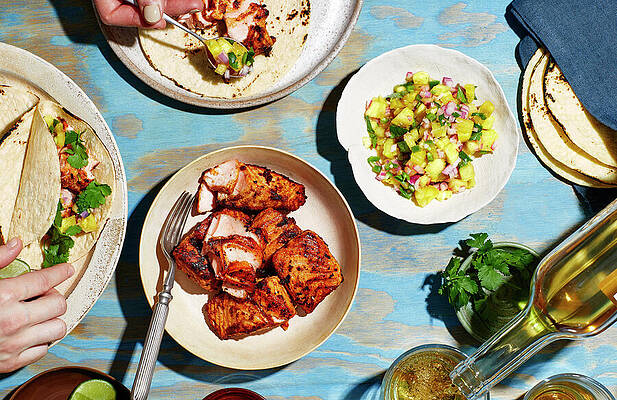 Sea Life Wall Art featuring the photograph Salmon Tacos With Pineapple-chile Salsa by Emma Fishman