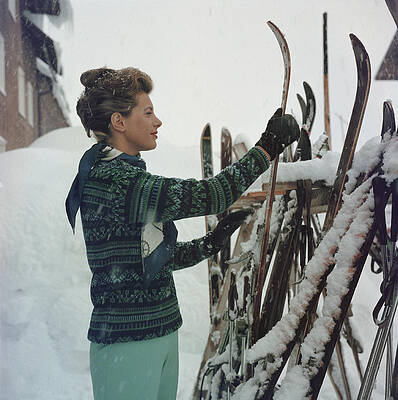 Elegantly Dressed Woman with Skis Wall Art